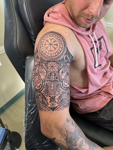 Explore disney tattoo sleeve ideas, creative tattoo ideas in Moultrie, available at Ink Addiction Tattoo Moultrie