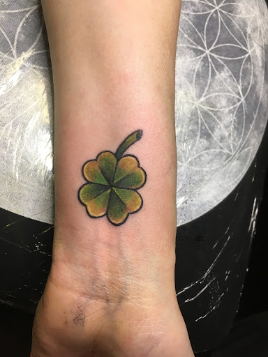 Explore cover up tattoo ideas for upper arm, creative tattoo ideas in Wallingford, available at Fox Den LLC