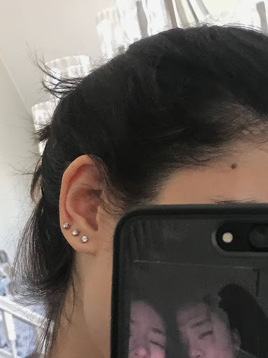 Explore women's cover up tattoo ideas, creative tattoo ideas in Mckinney, available at The Magic Needle Piercing Studio