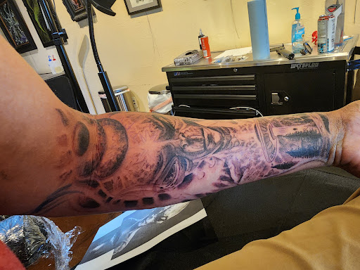 Explore small angel tattoo ideas, creative tattoo ideas in Peoria, available at Black Castle Art Co.