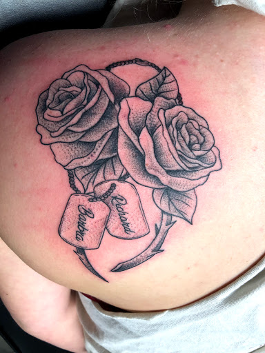 Explore meaningful elegant spine tattoo ideas, creative tattoo ideas in Greenfield, available at Tattoos In Time Studio