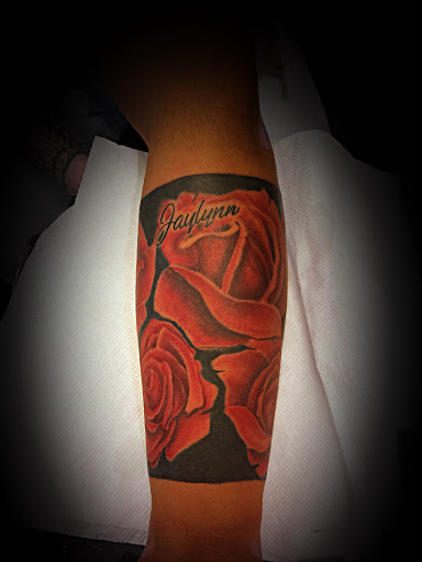 Explore parrot tattoo ideas, creative tattoo ideas in Madison, available at ART IMMORTAL TATTOO