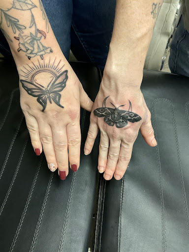 Explore totem pole tattoo ideas, creative tattoo ideas in Tuttle, available at Rebel Alliance Ink