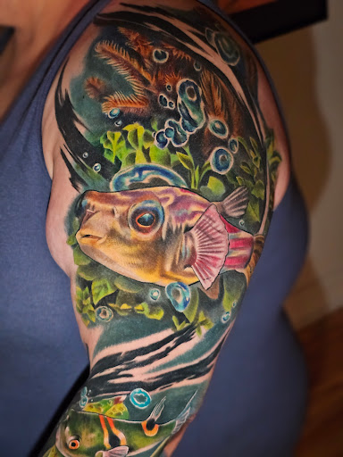 Explore beach tattoo ideas for ladies, creative tattoo ideas in Kansas City, available at Golden Stag Tattoo and Gallery