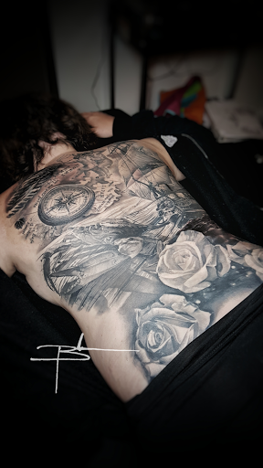 Explore female big tattoo ideas, creative tattoo ideas in Birmingham, available at Revolution Ink