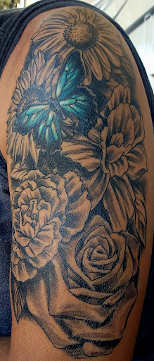 Explore cover up tattoo ideas for upper back, creative tattoo ideas in Stephenville, available at Artistic Realm Tattoos