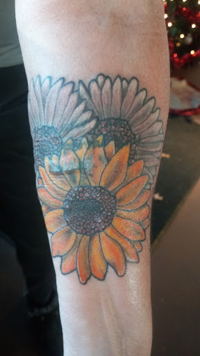 Explore gay couple tattoo ideas, creative tattoo ideas in Bardstown, available at Artistic Resurrection Tattoo Bardstown