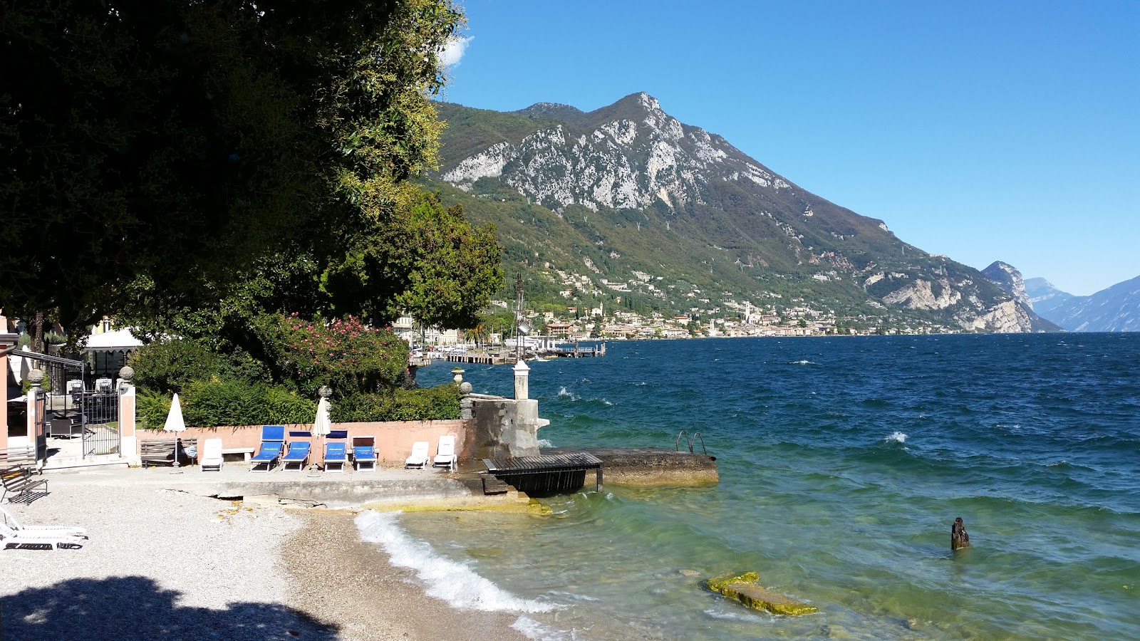 Foto van Spiaggia del Corno met turquoise puur water oppervlakte