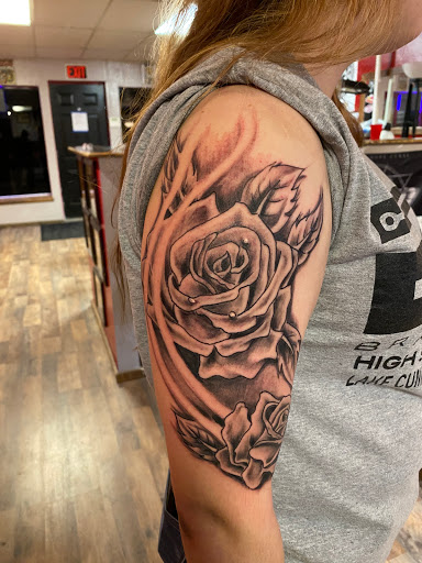 Explore lettering ideas tattoo, creative tattoo ideas in Pikeville, available at The Carbon Canary Tattoo Studio
