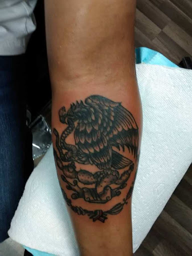 Explore leg tattoo ideas for females, creative tattoo ideas in Ozark, available at Tooth & Nail Tattoo & Piercing