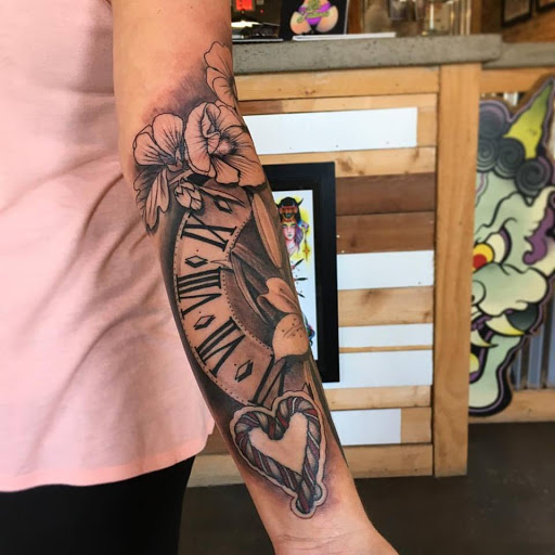 Explore maltese cross tattoo ideas, creative tattoo ideas in Dunn, available at Heart and Hammer Tattoo Co.
