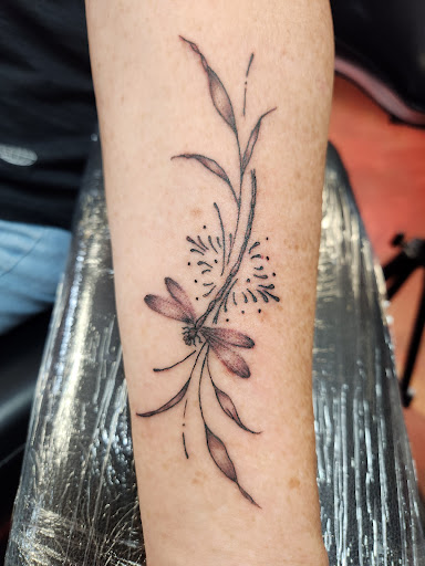 Explore gun tattoo ideas, creative tattoo ideas in Inverness, available at The Perfect Spot Tattoos