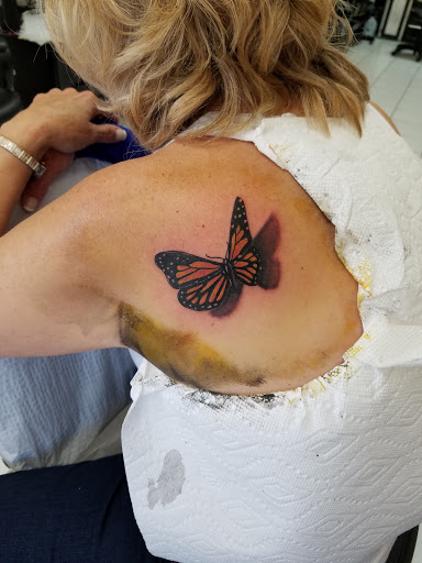 Explore paint tattoo ideas, creative tattoo ideas in Port Washington, available at Homeward Bound Tattoo