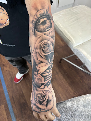 Explore ezra tattoo ideas, creative tattoo ideas in Rogers, available at Ink Solutions Tattoo