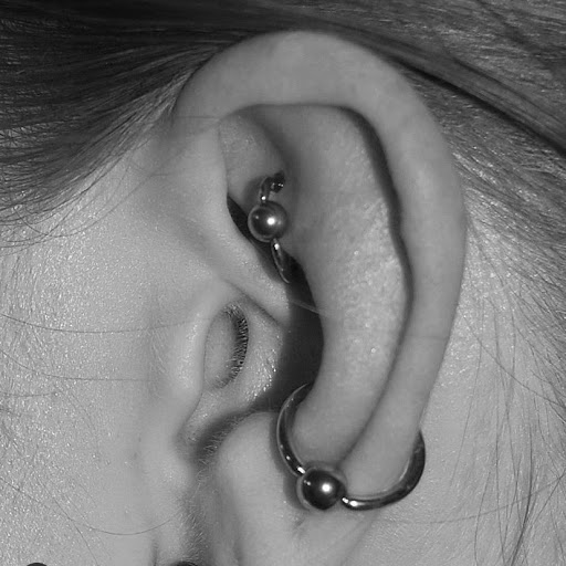 Explore womens leg sleeve tattoo ideas, creative tattoo ideas in Chapel Hill, available at Spica Body Piercing