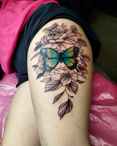 Explore vertical tattoo ideas, creative tattoo ideas in Lake City, available at Crooked Spines Tattoo Studio
