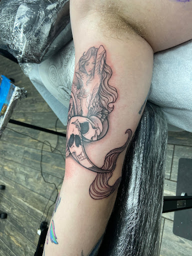 Explore mens thigh tattoo ideas, creative tattoo ideas in El Paso, available at American Tattoo Society of Ft Bliss