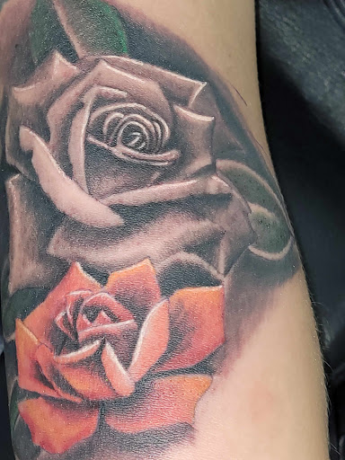 Explore finger tattoo ideas female, creative tattoo ideas in Angola, available at Hoodlum Ink