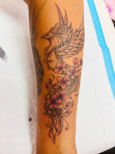Explore tattoo ideas for wife, creative tattoo ideas in Sioux City, available at Inkspired Atelier