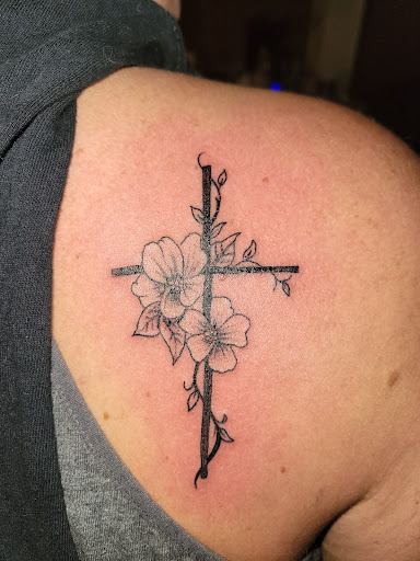 Explore family over everything tattoo ideas, creative tattoo ideas in Clinton, available at House of 1000 Needles