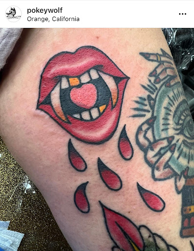 Explore small angel tattoo ideas, creative tattoo ideas in Orange, available at Black Palm Tattoo