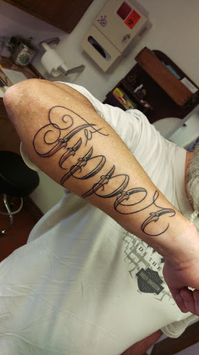 Tattoo Shop «Untouchable Ink», reviews and photos, 204 S Spring Garden Ave, DeLand, FL 32720, USA