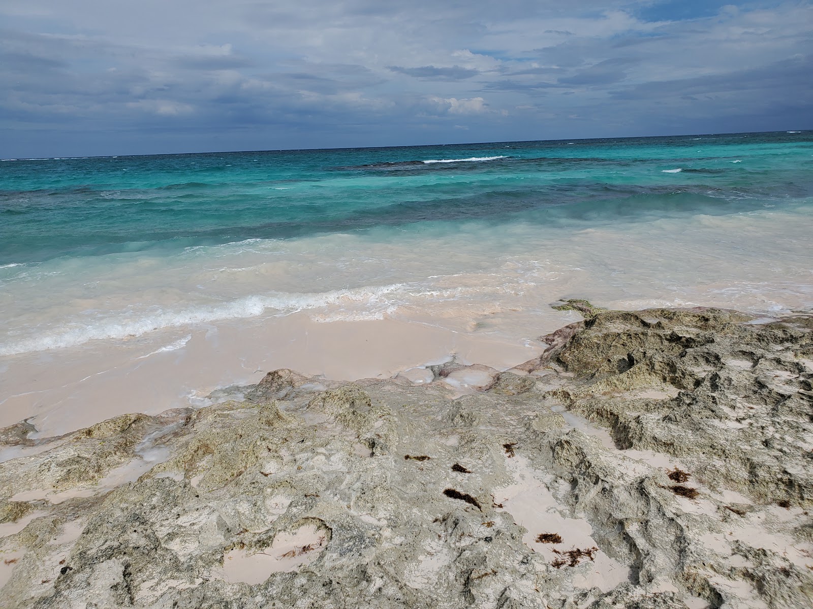 Foto van Governors Harbour beach met turquoise puur water oppervlakte