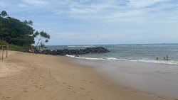 Foto von Jungle Beach mit eine gerade küstenlinie