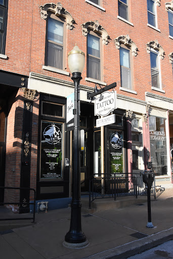 Explore thistle tattoo ideas, creative tattoo ideas in Dubuque, available at The Crows Nest