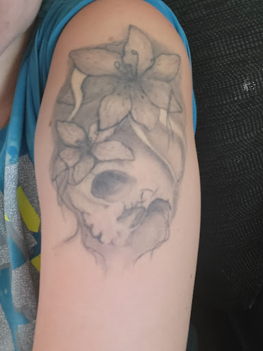 Explore arm and shoulder tattoo ideas, creative tattoo ideas in Grandville, available at Wicked Ways Tattooing