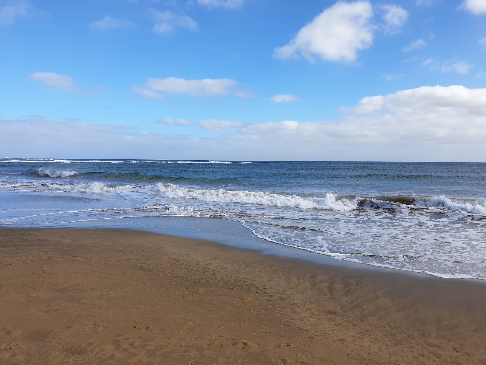 Photo de Playa Pocillos avec l'eau vert clair de surface