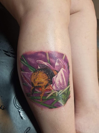 Explore barber pole tattoo ideas, creative tattoo ideas in Ocoee, available at Slaughterized Ink Tattoo and Piercing Studio