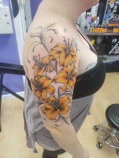 Explore thigh cover up tattoo ideas, creative tattoo ideas in Cambridge, available at Kappa Tattoo