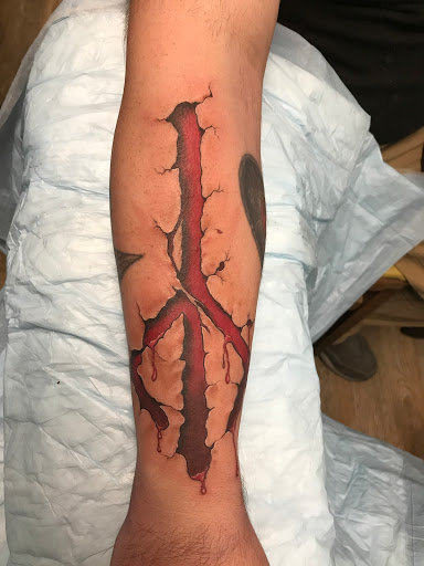 Explore cover up tattoo ideas for feet, creative tattoo ideas in Tewksbury, available at Lucid Arts Tattoo Studio