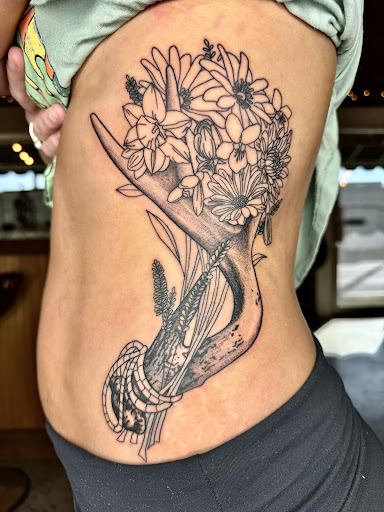 Explore pec tattoo ideas, creative tattoo ideas in Broxton, available at Seratonin Tattoo Parlor