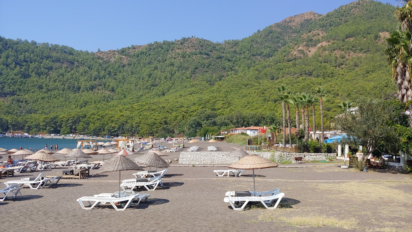 Ekincik beach II'in fotoğrafı mavi saf su yüzey ile