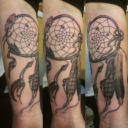 Explore race car tattoo ideas, creative tattoo ideas in Amherst, available at Wanderlust Tattoo & Piercing