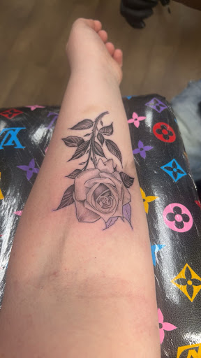 Explore hand tattoo ideas woman, creative tattoo ideas in Roanoke, available at Black Caesar Tattoos & Piercings