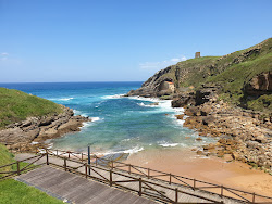 Playa de Santa Justa'in fotoğrafı küçük koy ile birlikte