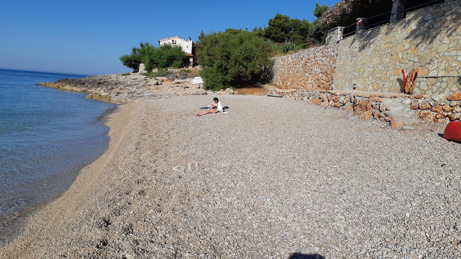 Foto von Skalinada beach mit viele kleine buchten