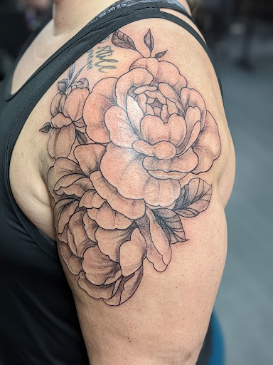 Explore infertility tattoo ideas, creative tattoo ideas in Tallahassee, available at Carbon Ink Tattoo