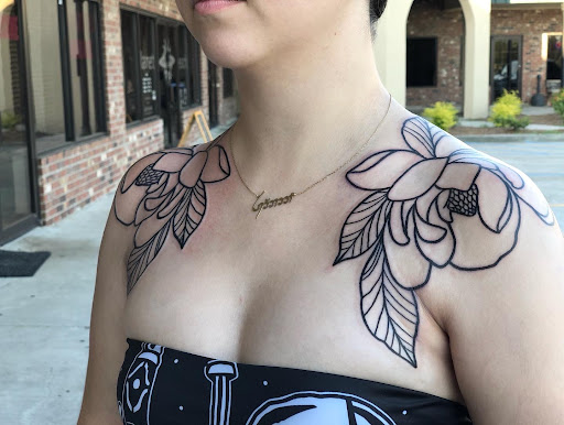 Explore ladies back tattoo ideas, creative tattoo ideas in Prairieville, available at Nolana Tattoo & Piercing