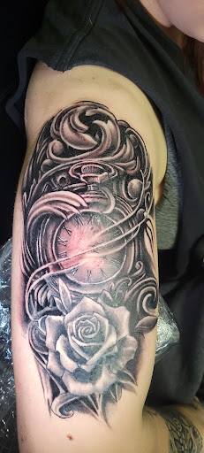 Explore tragus tattoo ideas, creative tattoo ideas in Angola, available at Hoodlum Ink