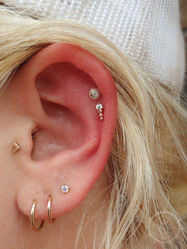 Explore breast cancer tattoos ideas, creative tattoo ideas in Eau Claire, available at Steel N Ink Body Piercing