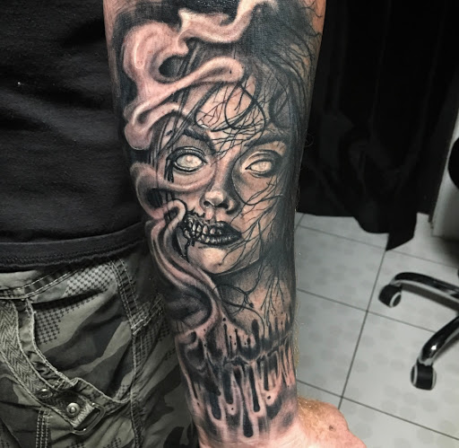 Explore back flower tattoo ideas, creative tattoo ideas in Bronx, available at Anarchy Tattoo Studios