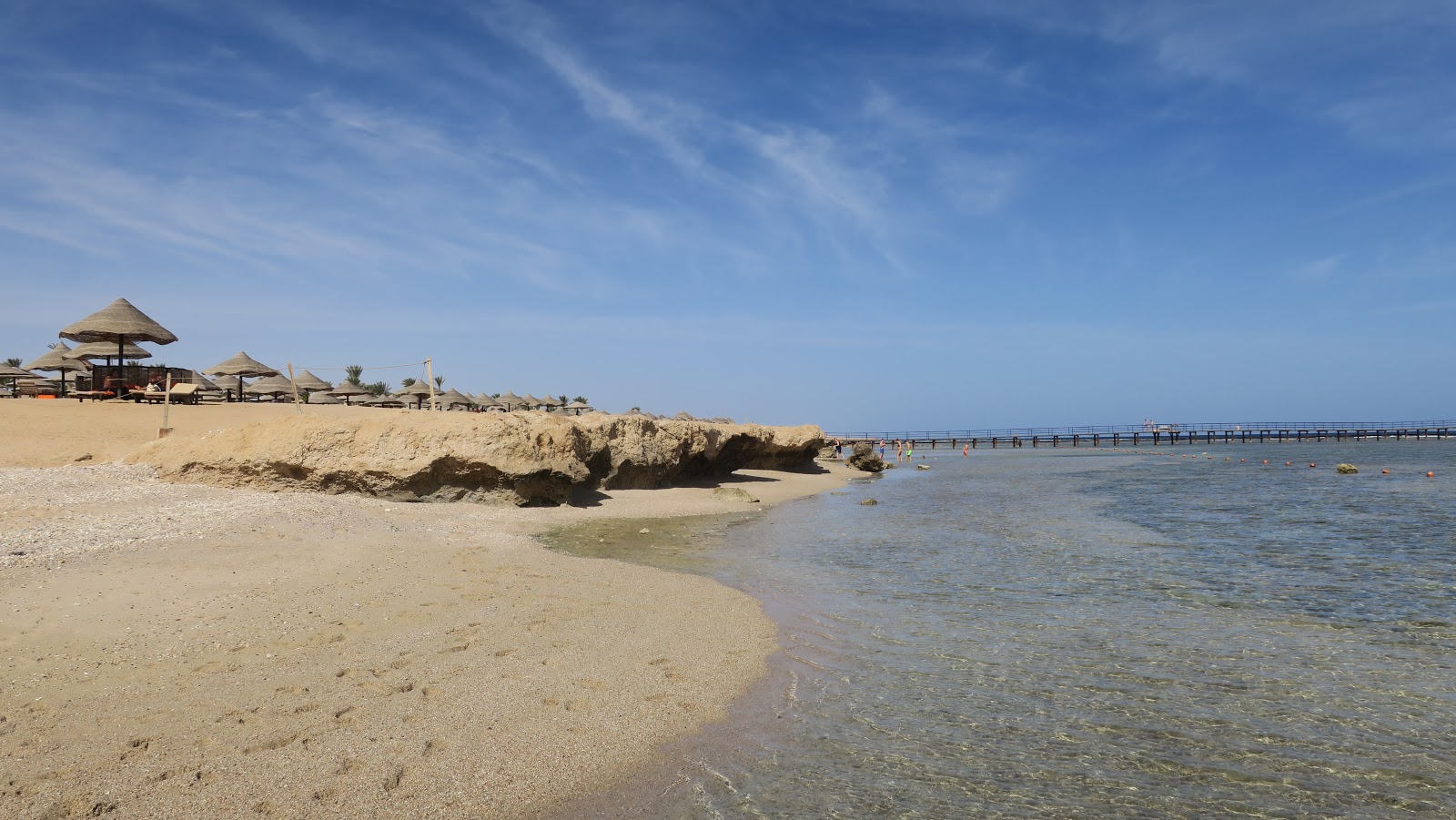 Fotografija Ghalib Beach in naselje