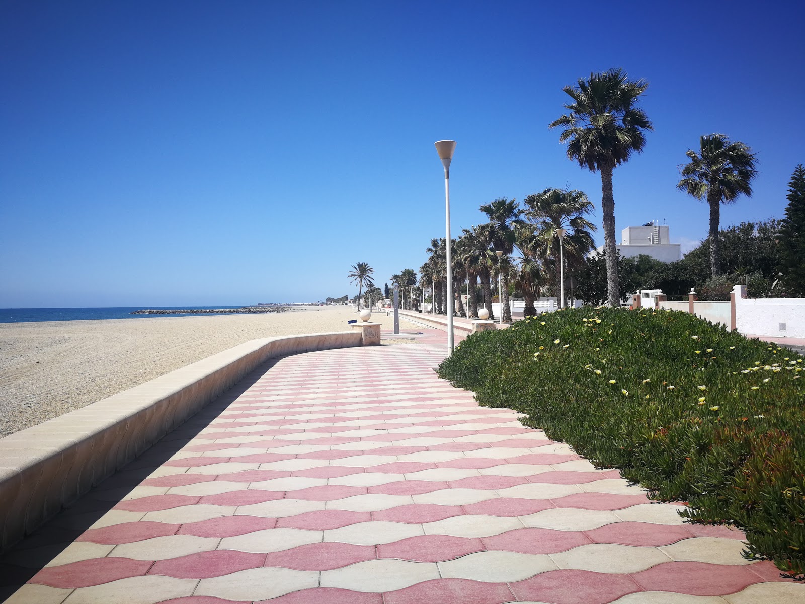 Playa Costa Cabana'in fotoğrafı mavi sular yüzey ile