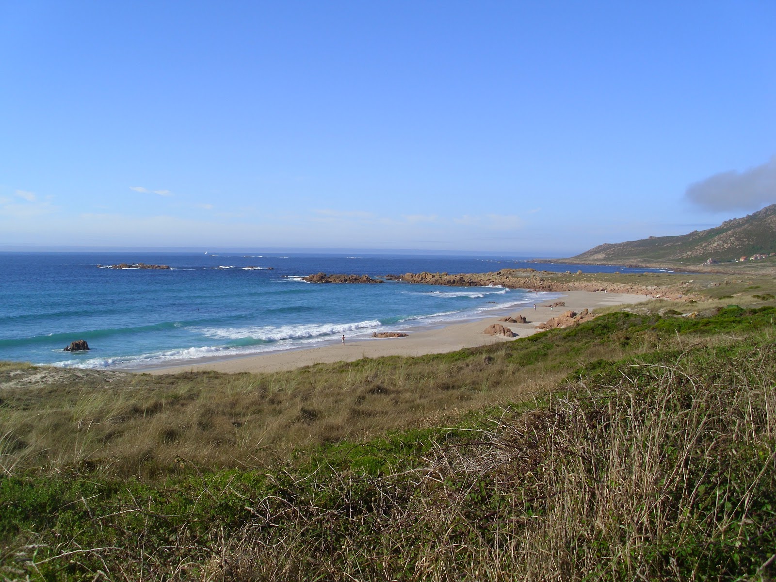 Φωτογραφία του Playa de Balea με ψιλή λευκή άμμος επιφάνεια