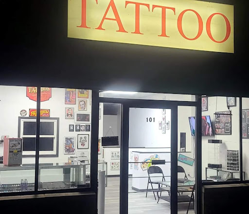 Explore red bird tattoo ideas, creative tattoo ideas in Barnhart, available at Malevolent Art Studio