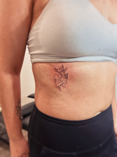 Explore healing tattoo ideas, creative tattoo ideas in Burley, available at Fine Line Ink